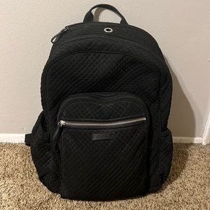 Black Vera Bradley book bag. Pink and tan floral pattern on inside.